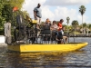 Airboat clients looking at manatee