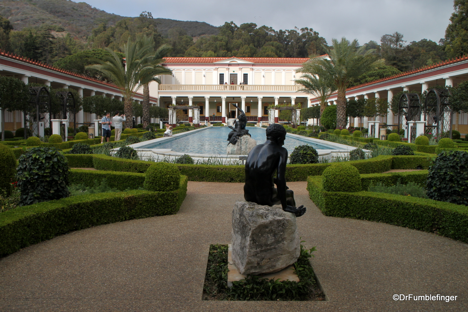 Outer Peristyle, Getty Villa. A typically Roman era collection of plants, statues, walkways and pool