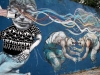 Street art on Charcarita walls. Tiger-Football player hybrids by Jaz