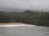 Tropical storm conditions existed, with rain and strong surf, Kalihiwai