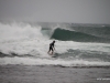 Tropical storm conditions existed, with rain and strong surf, Kalihiwai