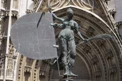 Copy of El Giraldillo, the weathervane of the Giralda, outside the main entrance to the Cathedral