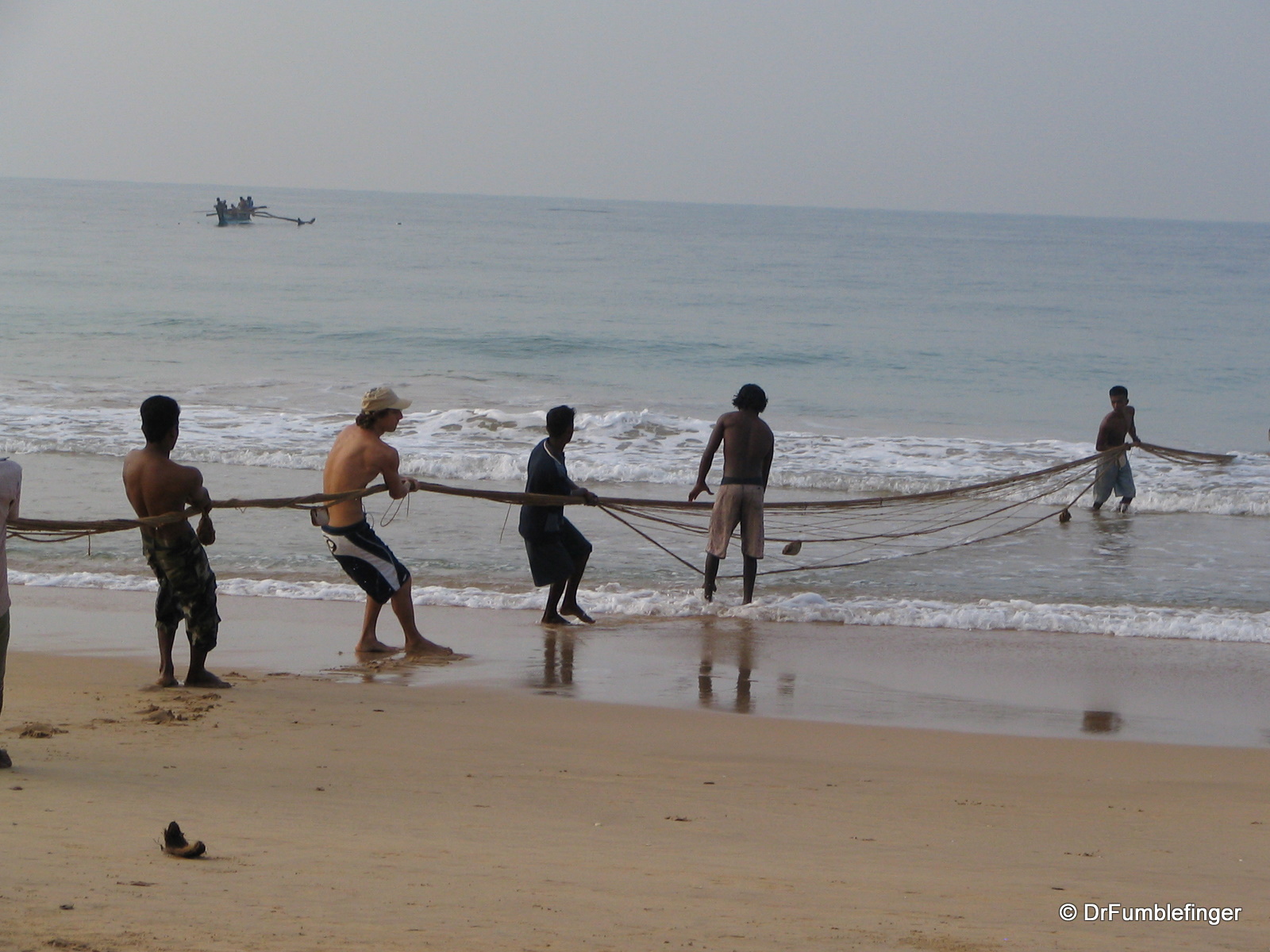 Hikkaduwa fishermen pulling in nets
