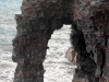 Volcanoes National Park. Holei Sea Arch: a natural arch, pounded by the powerful surf. Chain of Craters Road